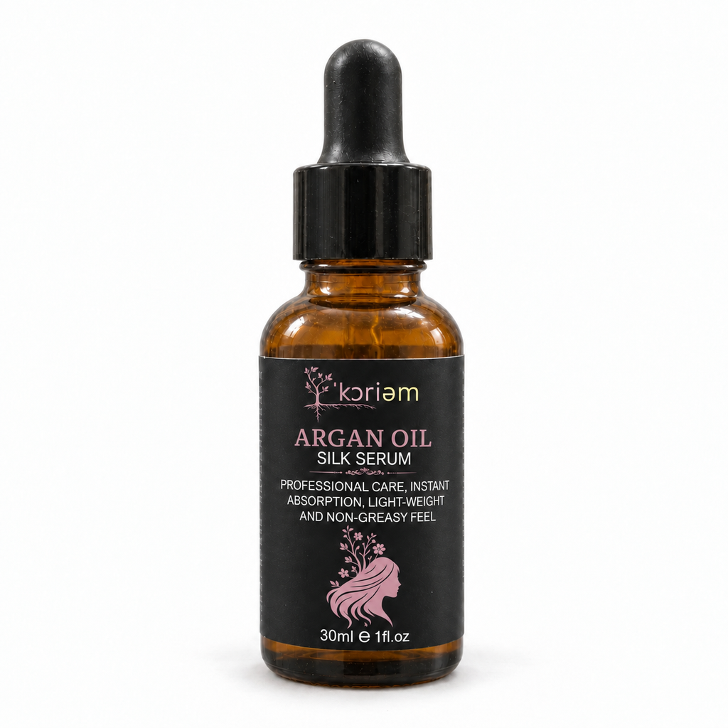 ‘Koriem Argan Oil Silk Serum in a 30 mL amber glass dropper bottle on a white background