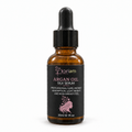 ‘Koriem Argan Oil Silk Serum in a 30 mL amber glass dropper bottle on a white background