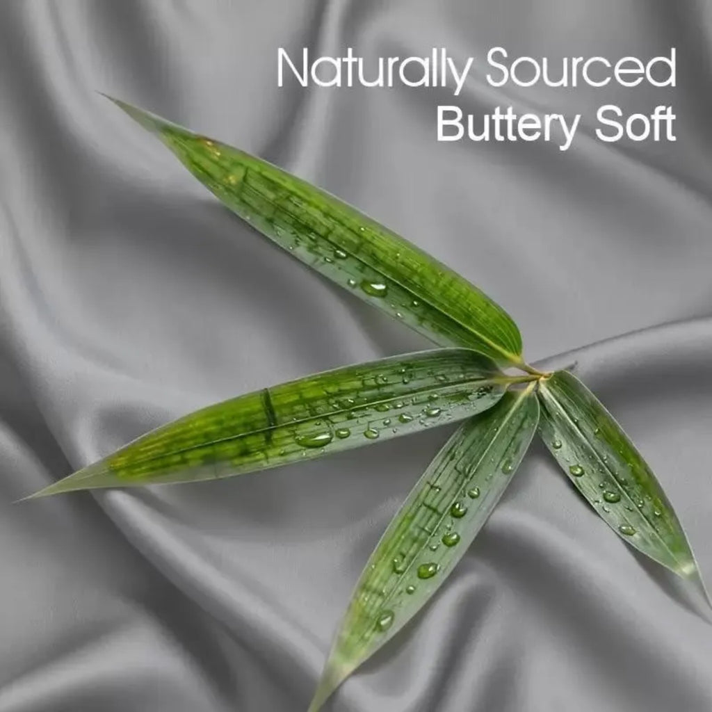 Bamboo leaves on smooth fabric illustrating Dream Bloom pillowcase softness
