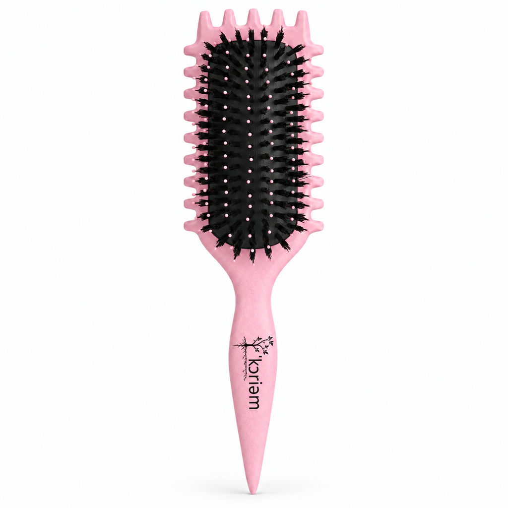 Pink ‘Koriem Curl Bloom Detangling and Defining Brush with black bristles and pointed sectioning handle