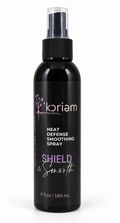Shield & Smooth Heat Defense Smoothing Spray in a glossy black 6 fl oz bottle